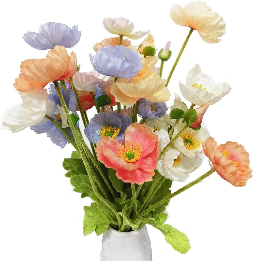A soft and whimsical bouquet of faux poppies in muted pastel tones like peach, lavender, and pale yellow, with light green stems in a casual wildflower arrangement.